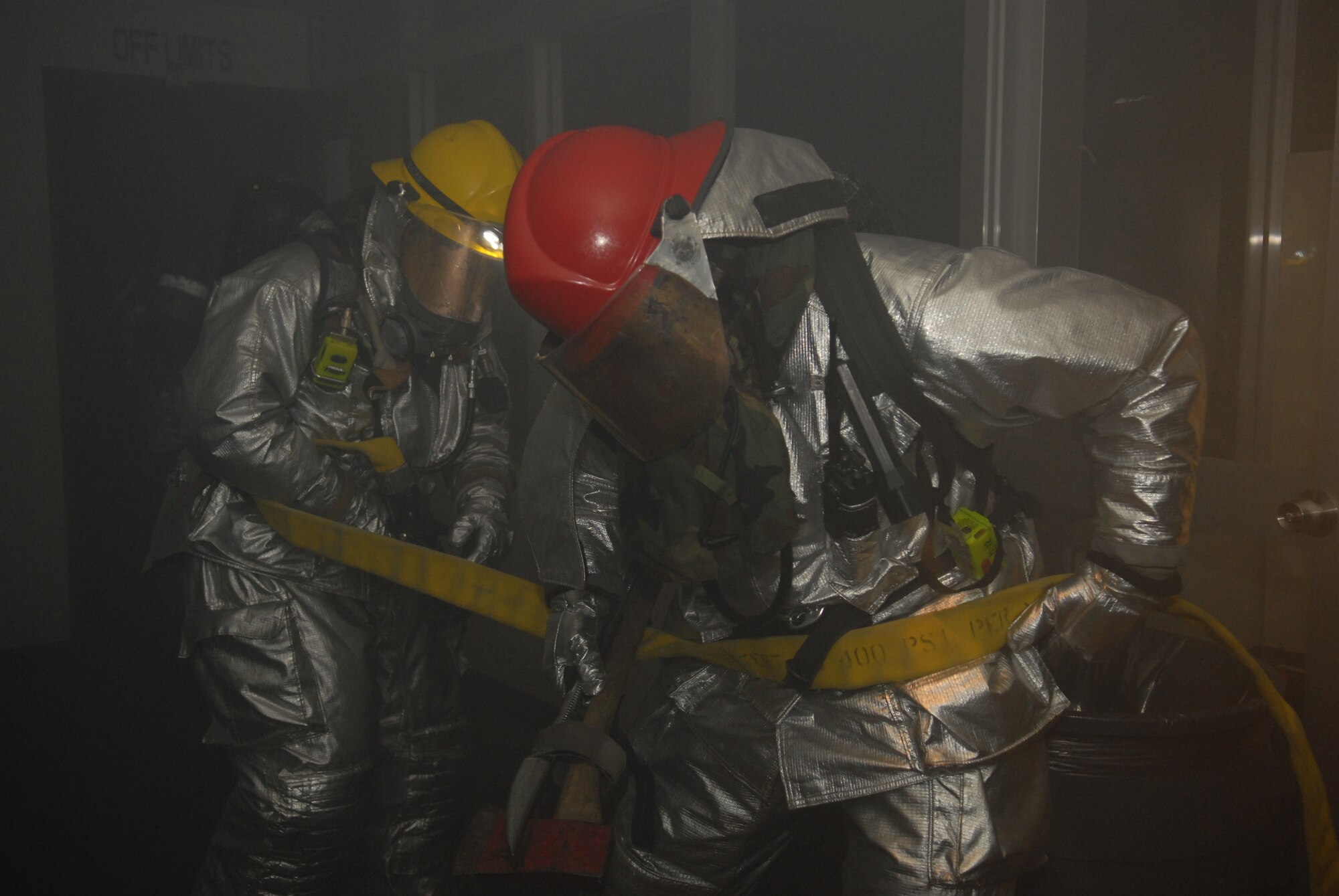 Firefighters from the 18th Civil Engineer Squadron respond to a simulated fire from a mortar attack during Beverly High 09-2 Local Operational Readiness Exercise at Kadena Air Base, May 14. The LORE tests base personnel on their combat readiness for real world emergency/combat events.
(U.S. Air Force photo/Tech. Sgt. Angelique Perez) 