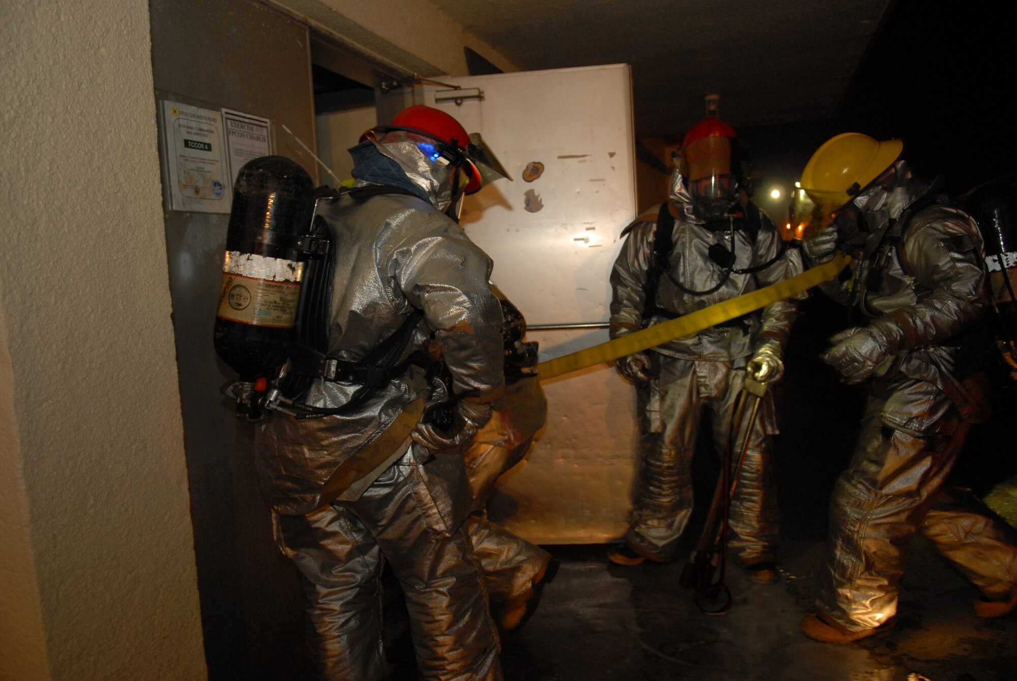 Firefighters from the 18th Civil Engineer Squadron respond to a simulated fire from a mortar attack during Beverly High 09-2 Local Operational Readiness Exercise at Kadena Air Base, May 14. The LORE tests base personnel on their combat readiness for real world emergency/combat events.
(U.S. Air Force photo/Tech. Sgt. Angelique Perez) 