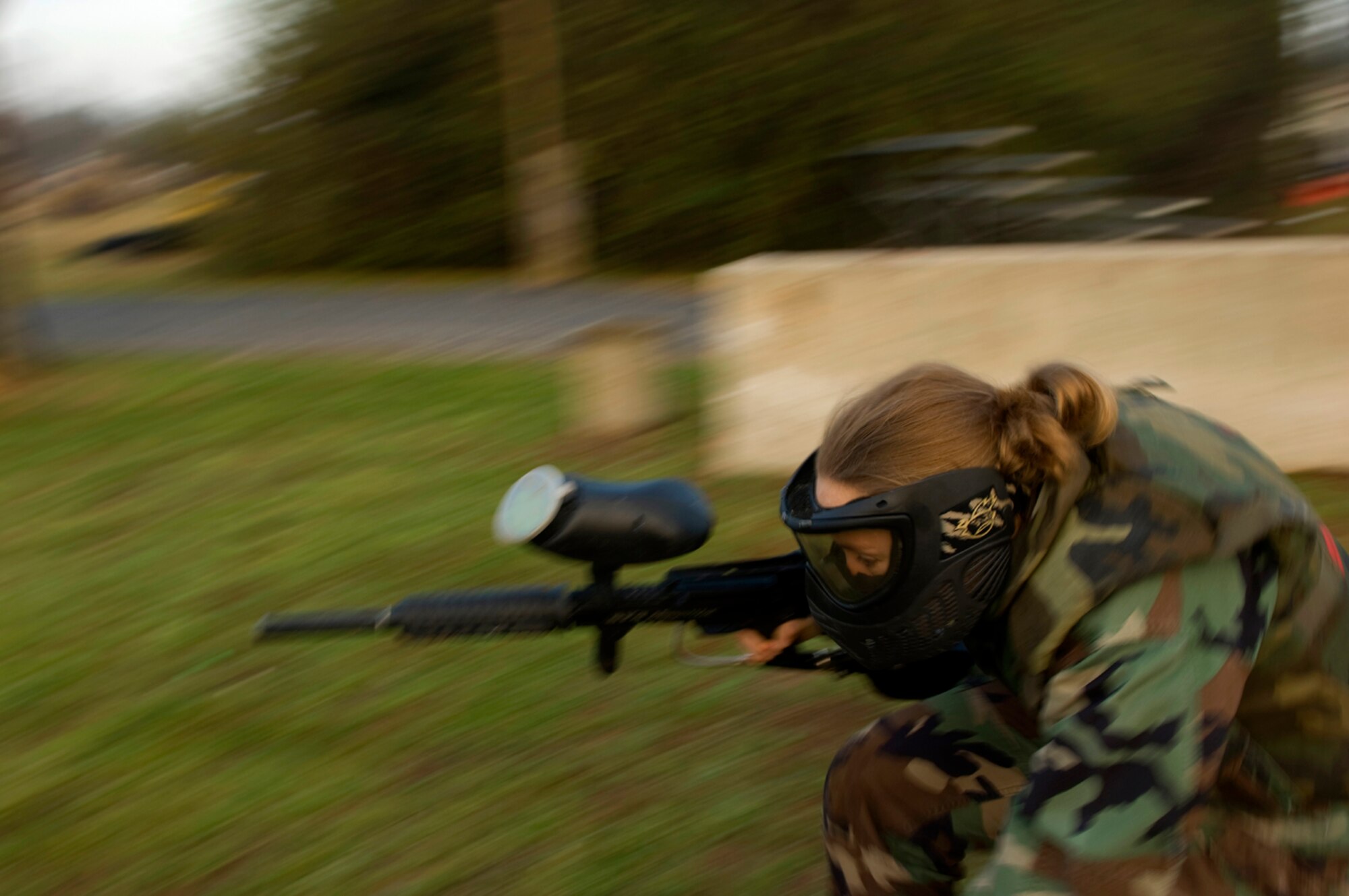 This isn’t your typical game of paintball, as Capt. Maygen Wilson and her teammates quickly discover. The Squadron Officer School uses  this combat exercise to promote teambuilding and leadership. Students can only graduate as the top class by working together. (photo by Tech. Sgt. Matthew Hannen)