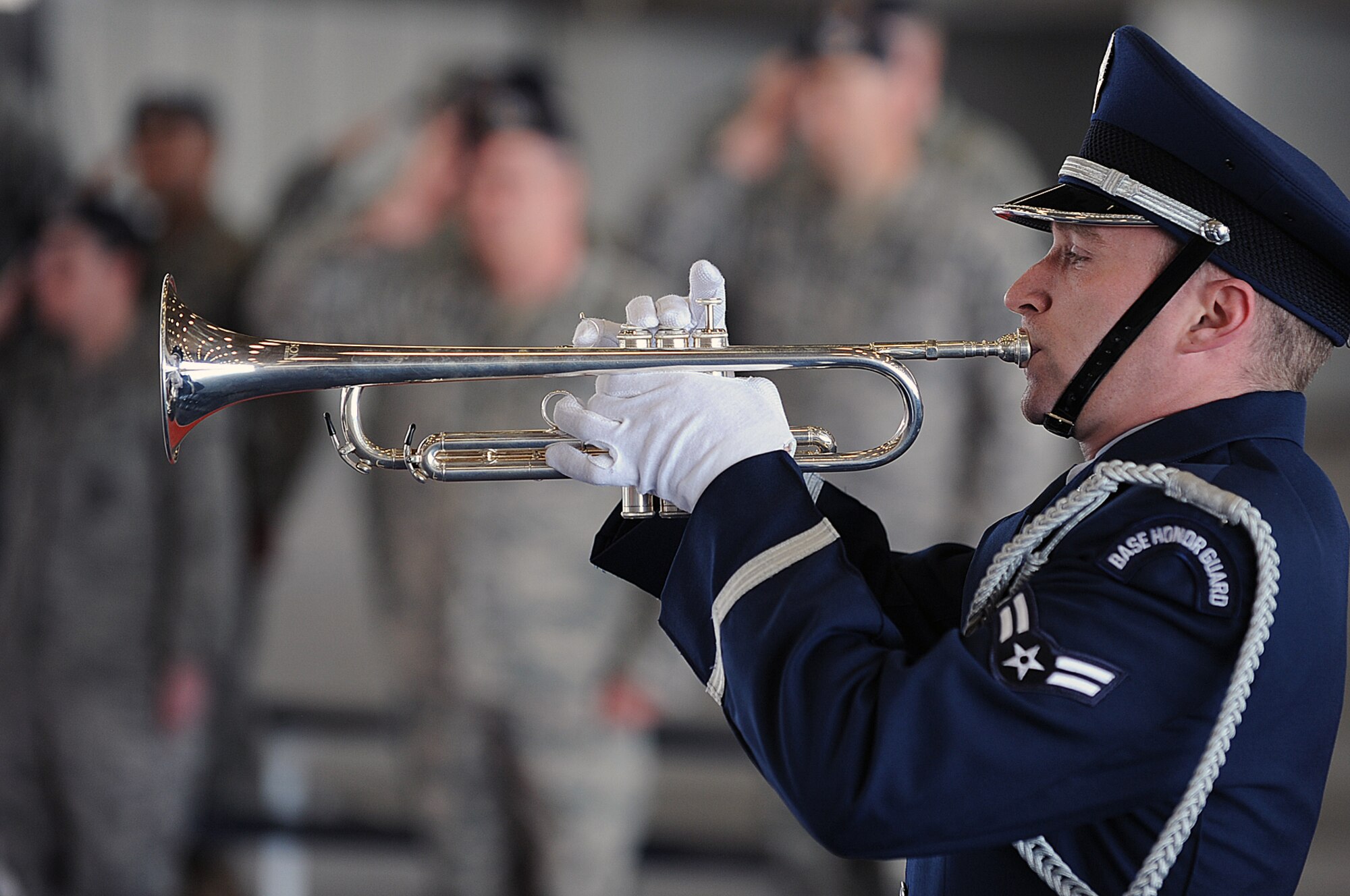 Airman 1st Class David Bailey, 28th Force Support Squadron promotions apprentice, plays “Taps” in honor of fallen police officers during a National Police Week retreat here, May 13. National Police Week has honored local, state, and federal fallen officers for 46 years.  (U.S. Air Force photo/Airman 1st Class Joshua J. Seybert)