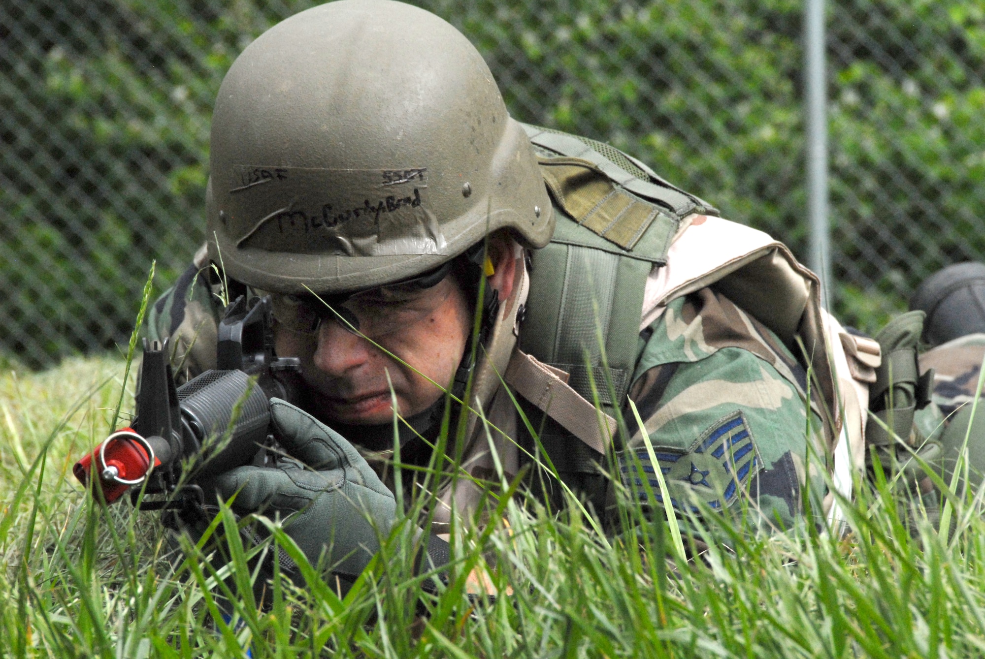 Staff Sgt. Brad McCurdy, 442nd Civil Engineer Squadron, keeps watch for the enemy following a simulated attack during an Operational Readiness Exercise at Whiteman Air Force Base, Mo, May 13, 2009. The 442nd CES is part of the 442nd Fighter Wing is an Air Force Reserve Command A-10 Thunderbolt II unit. (US Air Foce photo/Master Sgt. Bill Huntington)