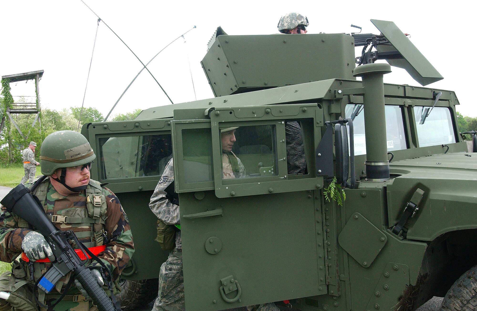 Staff Sgt. Jerad McCann, 442nd Civil Engineer Squadron, exits a Humvee to take cover following an attack on his convoy during an Operational Readiness Exercise at Whiteman Air Force Base, Mo, May 13, 2009. The 442nd CES is part of the 442nd Fighter Wing, an Air Force Reserve Command A-10 Thunderbolt II unit. (US Air Force photo/Tech. Sgt. John Vertreese)