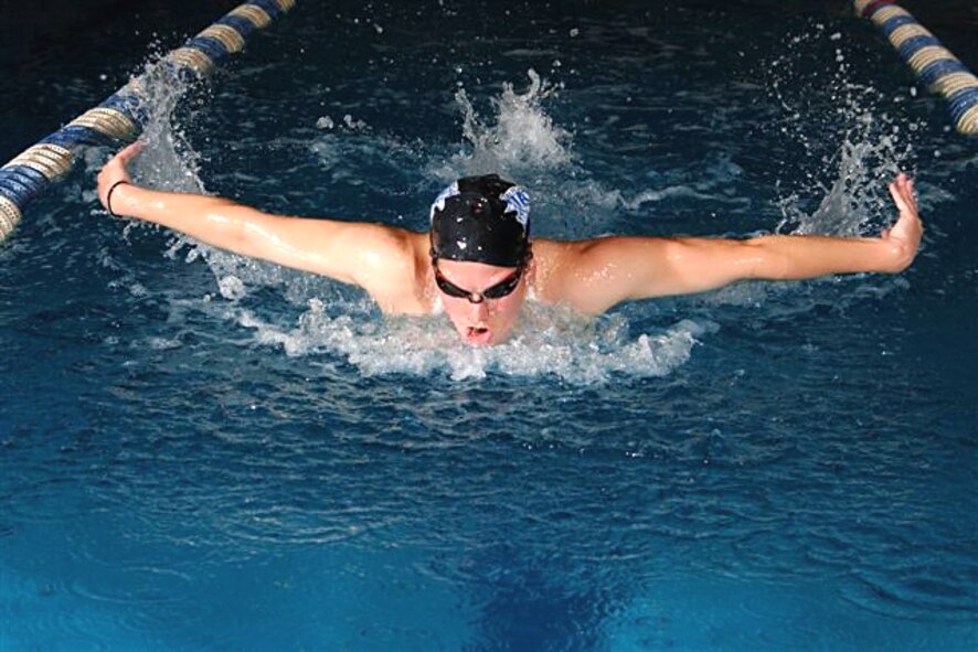 Second Lt. Lindsey Kirchhoff, 4th Aircraft Maintenance Squadron section commander, swims during a 2006 team practice at the Air Force Academy in Colorado Springs, Colo. Lieutenant Kirchhoff led the Air Force women's team to victory against counterparts from NATO countries in the Allied Air Component Command swimming competition in Zakopane, Poland, April 16, 2009. (U.S. Air Force photo by Danny Meyer)