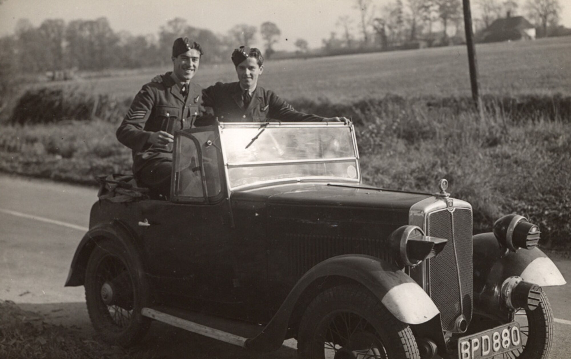 This snapshot, taken in 1942 at RAF Mildenhall, shows Sergeant Jim Coman (right) and a fellow aerial gunner.  At the time, Sergeant Coman was a radio operator and gunner on Royal Air Force Wellington 1C bombers, and eventually flew on Stirling and Lancaster bombers as well.  (Contributed photo)