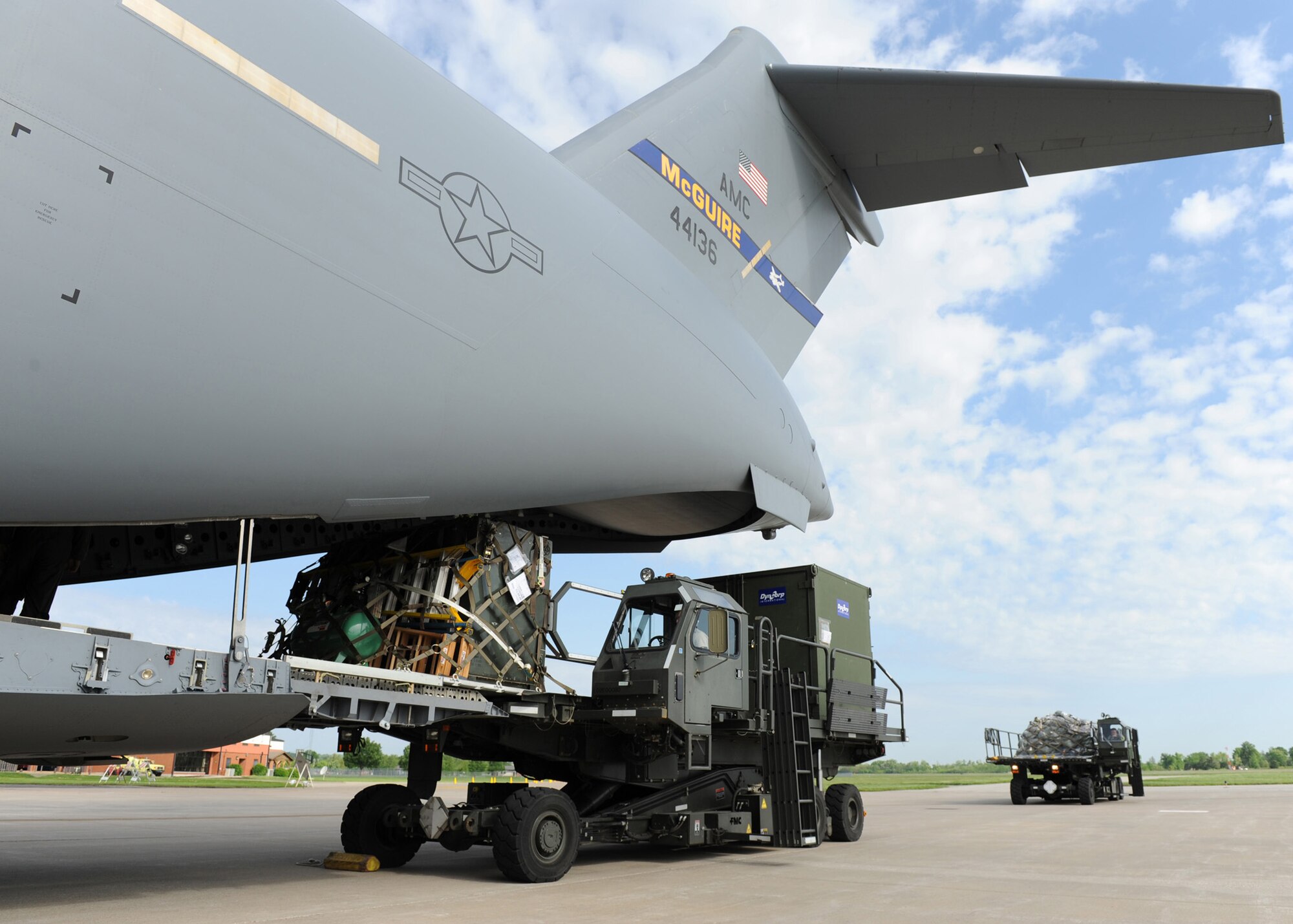 SCOTT AIR FORCE BASE, Ill. -- Pallets of cargo are offloaded from a K-Loader onto a C-17 Globemaster III at Scott Air Force Base, Ill., May 12. The cargo will be flown to Volk Field, Wisc., where 375th Airlift Wing Airmen will train with the Minnesota Air National Guard 133rd Airlift Wing and the 94th Arial Port Squadron (reserve) from Robins Air Force Base, Ga. in preparation for the wing's for the operational readiness inspection in March 2010.  (U.S. Air Force photo/Staff Sgt. Paul Villanueva II)