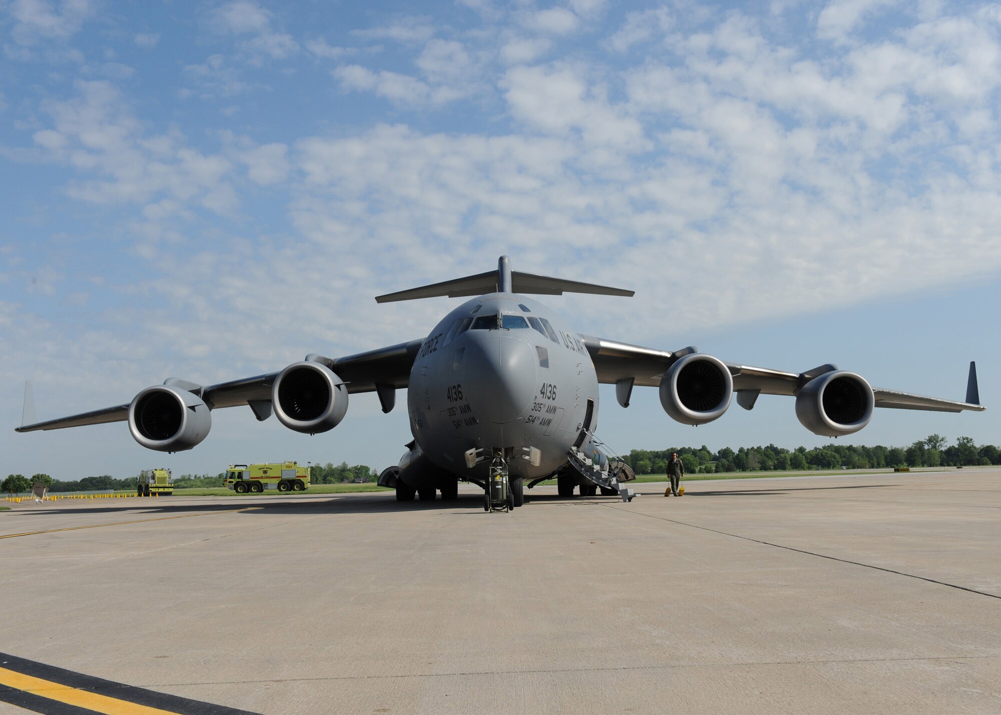 SCOTT AIR FORCE BASE, Ill. -- Airman 1st Class Samantha Earnest, loadmaster with the 6th Airlift Squadron at McGuire Air Force Base, N.J., positions cargo for a flight aboard a C-17 Globemaster III at Scott Air Force Base, Ill., May 12. The cargo will be flown to Volk Field, Wisc., where 375th Airlift Wing Airmen will train with the Minnesota Air National Guard 133rd Airlift Wing and the 94th Arial Port Squadron (Reserve) from Robins Air Force Base, Ga. in preparation for the wing's for the operational readiness inspection in March 2010.  (U.S. Air Force photo/Staff Sgt. Paul Villanueva II)