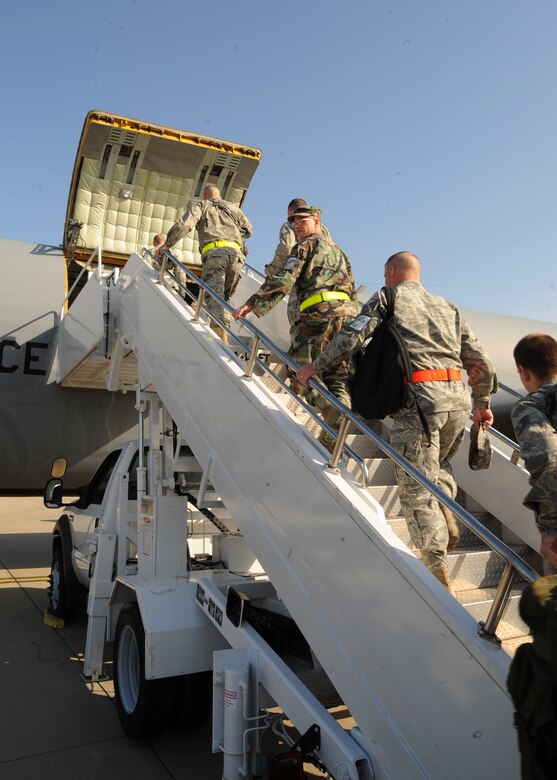 VOLK FIELD, Wisc.--Airmen from the 375th Airlift Wing board a KC-135E Stratotanker at Scott Air Force Base, Ill., before departing for a week-long training mission at Volk Field, Wisc., May 12. The training mission is meant to help hone their skills and put to use the skills they have already learned while simulating a real-world mission deployment. (U.S. Air Force photo/Airman 1st Class Wesley Farnsworth)

