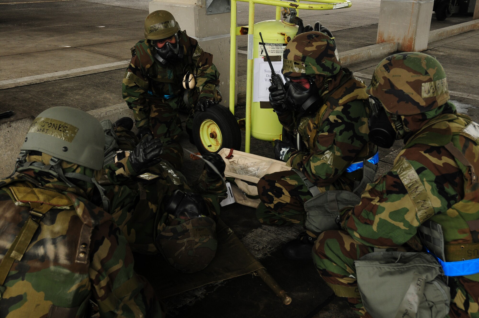 Airmen from the 18th Aircraft Maintenance Squadron perform self-aid buddy care during the Beverly High 09-2 Local Operational Readiness Exercise May 14. The LORE tests base personnel on their combat readiness for real world emergency/combat events.
(U.S. Air Force photo/Airman 1st Class Amanda Grabiec)