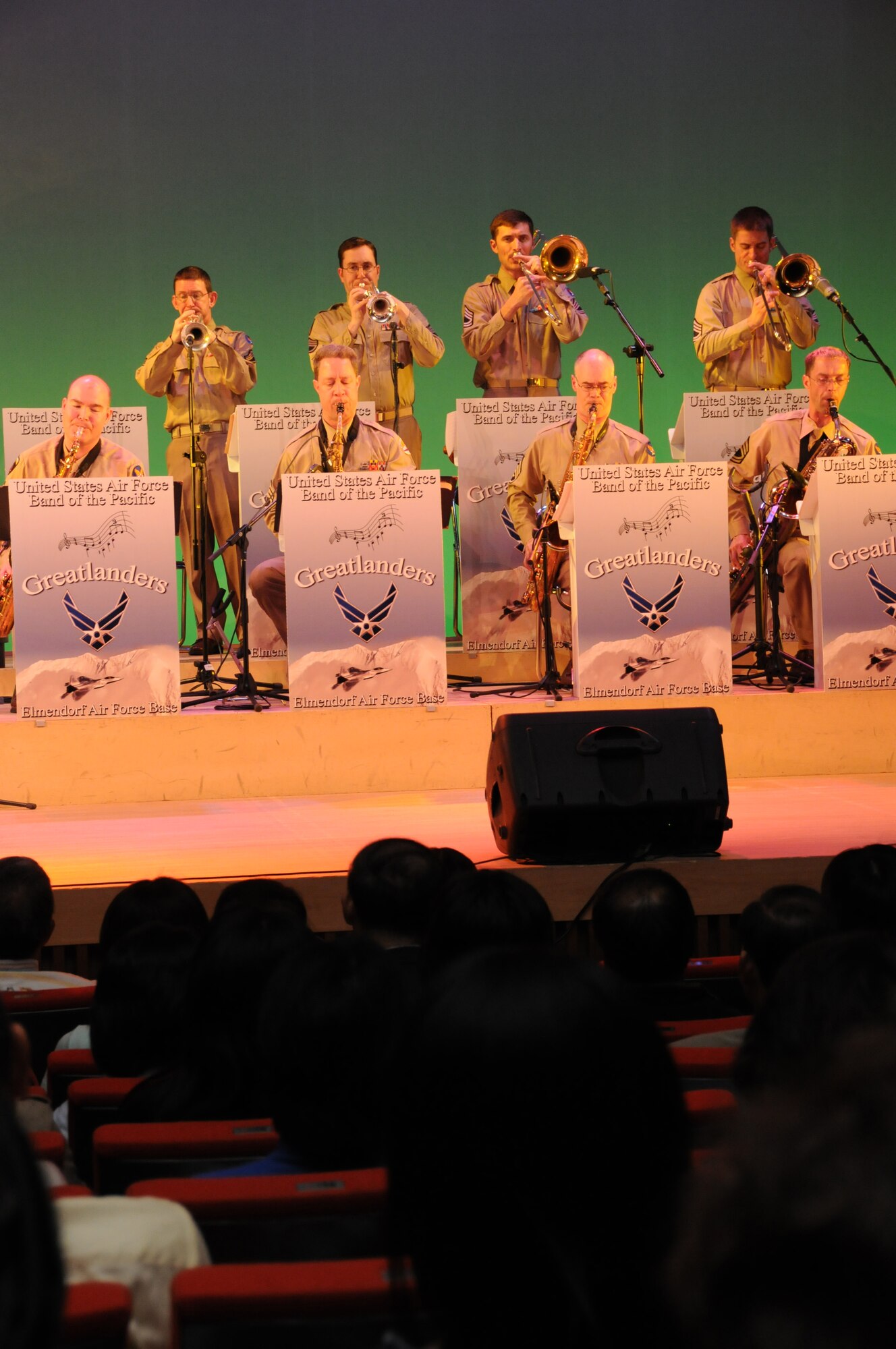 OME, Japan -- Final Approach protocol combo members from Yokota perform for the citizens of Ome during a concert at the city's auditorium May 13. Final Approach joined forces with the Greatlanders, a 15-piece popular music combo from the U.S. Air Force Band of the Pacific at Elmendorf Air Force Base, Alaska, have joined forces for a tour of Japan May 6-17. The newly formed Ome-Yokota Friendship Club sponsored the concert. (U.S. Air Force photo/Tech. Sgt. Kimberly Spinner)