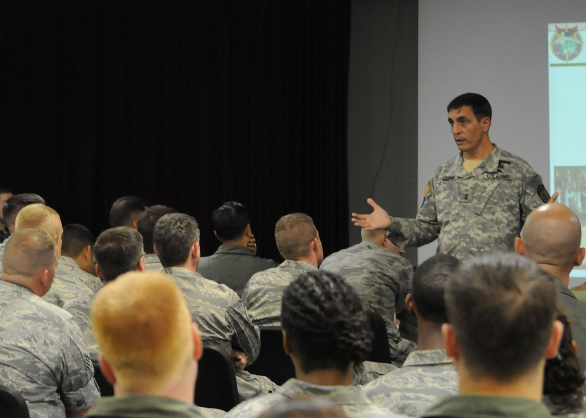 KADENA AIR BASE, Japan -- Maj. Gen.  Salvatore Cambria, the commander of Special Operations Command, Pacific, briefs Air Commandos of the 353rd Special Operations Group here May 13 on the mission and challenges his command faces in the region during his final visit to the 353rd SOG in his current position. The general thanked the men and women assigned to the group for being a critical component of his command and carrying out their mission even though they faced many difficult challenges. (U.S. Air Force photo by Tech. Sgt. Aaron Cram)