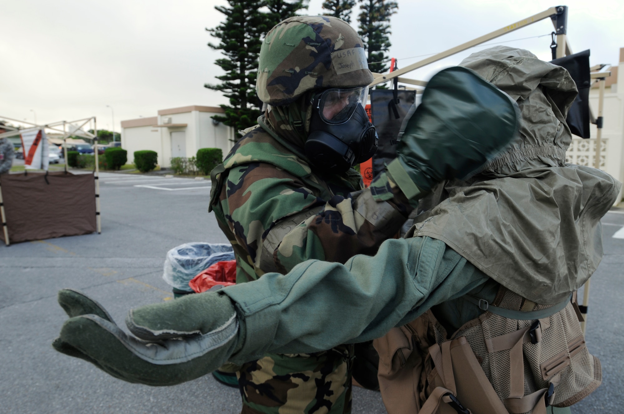 An aircrew member is decontaminated during Beverly High 09-2 Local Operational Readiness Exercise May 13. The LORE tests base personnel on their combat readiness for real world emergency/combat events. 
(U.S. Air Force photo/Airman 1st Class Chad Warren)