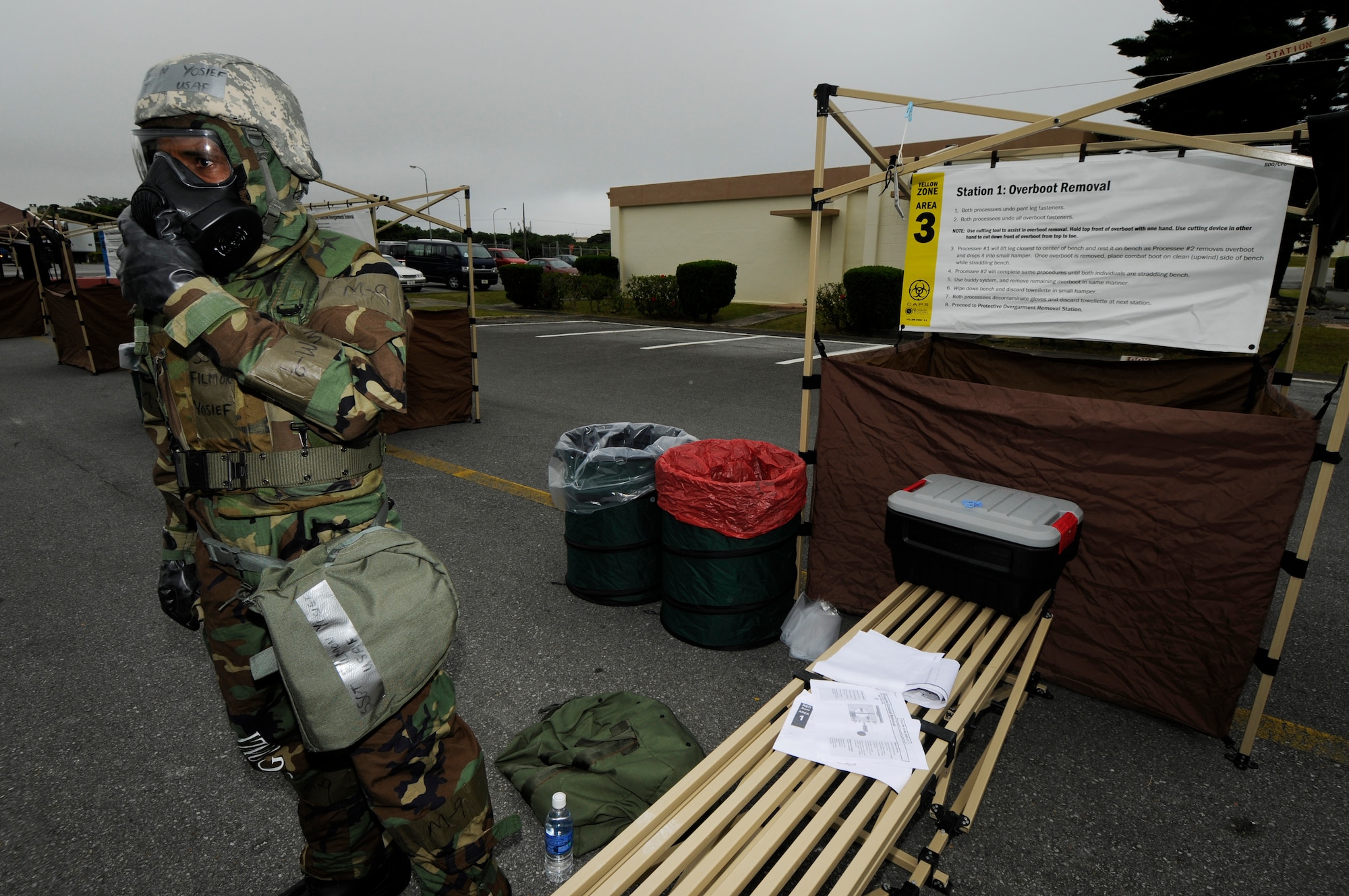 Staff Sgt. Filmon Yosief, 18th Operations Support Squadron, prepares to decontaminate aircrew members during Beverly High 09-2 Local Operational Readiness Exercise May 13. The LORE tests base personnel on their combat readiness for real world emergency/combat events. 
(U.S. Air Force photo/Airman 1st Class Chad Warren)