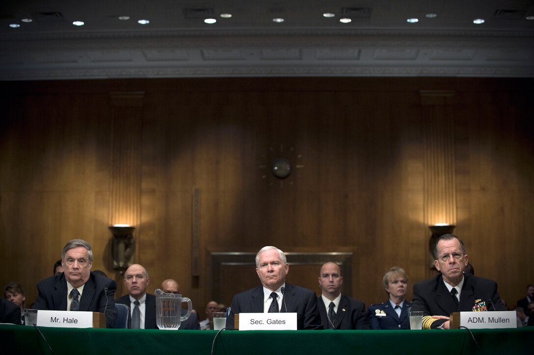 Under Secretary of Defense Comptroller Robert Hale, left, Defense Secretary Robert M. Gates, center, and Navy Adm. Mike Mullen, chairman of the Joint Chiefs of Staff, testify before the Senate Armed Services Committee on the 2010 National Defense Authorization Budget Request in Washington, D.C., May 14, 2009.