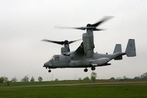 An Osprey takes off from the Sears Holdings May 13. Marines flew into a static display during Marine Week Chicago and allowed people in attendance to walk through the aircraft. The crowd also had the opportunity to handle an array of weapons Marines use daily. Vehicles used by Marines were also on display and open for the people to climb into.