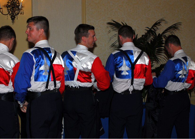 Graduating F-16 students model their Lone Star Gunfighters mess dress shirts at a B-Course graduation banquet at the Guenther Hotel on May 8, 2009. The B-Course, taught by members of the 182nd Fighter Squadron, Texas Air National Guard, is an 8-month training program where pilots learn to fly the F-16 Fighting Falcon. 