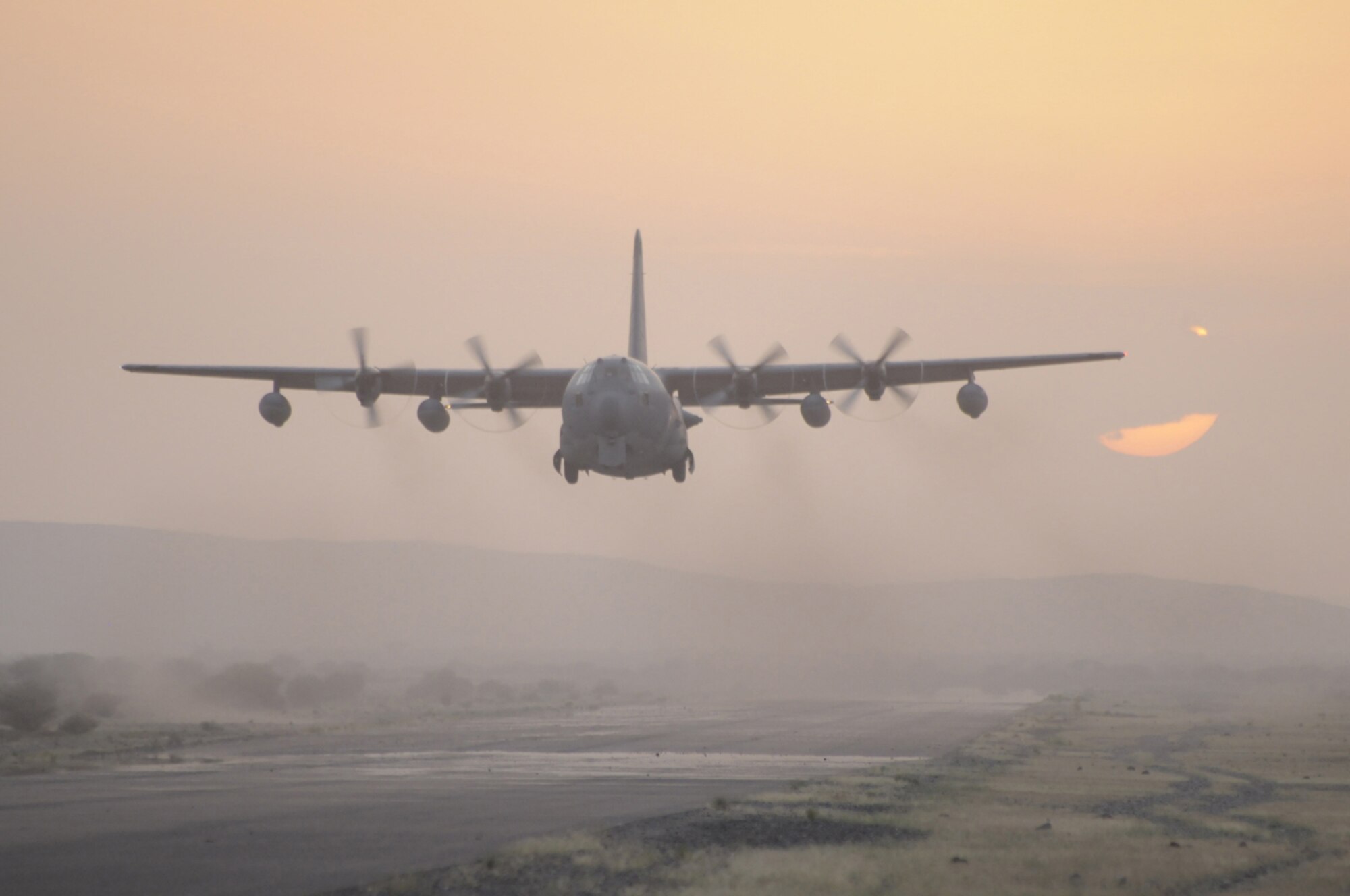 An Air Force Reserve Command HC-130 aircraft lands on an unimproved airstrip in Africa. The 920th Rescue Wing from Patrick Air Force Base, Fla., sent about 100 reservists to Djibouti, Africa, to provide combat search-and-rescue support for two months. The last group of 28 reservists returned to Patrick AFB on May 14, 2009. (U.S. Air Force photo/Master Sgt. Rob Grande)