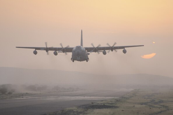 An Air Force Reserve Command HC-130 aircraft lands on an unimproved airstrip in Africa. The 920th Rescue Wing from Patrick Air Force Base, Fla., sent about 100 reservists to Djibouti, Africa, to provide combat search-and-rescue support for two months. The last group of 28 reservists returned to Patrick AFB on May 14, 2009. (U.S. Air Force photo/Master Sgt. Rob Grande)