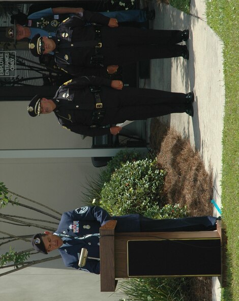 Master Sergeant Carlos Nunez, 325th Security Forces Squadron operations superintendent, names seven Air Force SF Airmen being honored for dying in the line of duty during National Police Day, May 14.  (U.S. Air Force photo/2nd Lt. Cody Chiles)