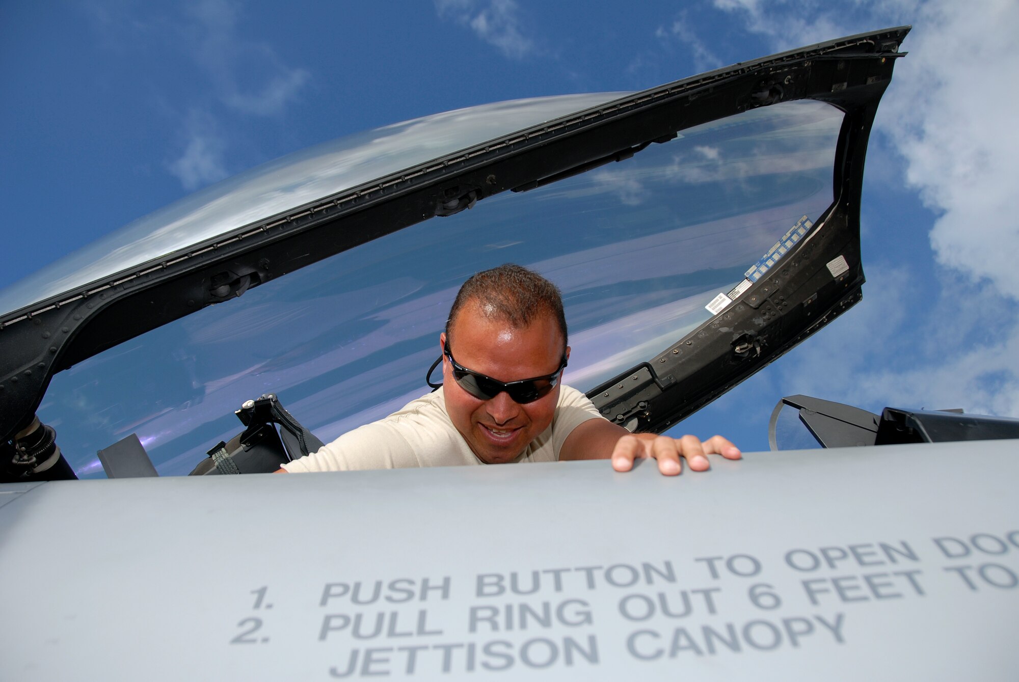 Staff Sgt. Jose Irizarry, a crew chief with the 115th Fighter Wing, Madison, Wis., prepares one of the units F-16C Fighting Falcons for the morning launch April 29, 2009. The 115th FW participated in an air-to-air combat skills training exercise April 18 - May 2, 2009 along side their naval counterparts from Strike Fighter Squadron 2 (VFA-2), Naval Air Station Lemoore, Calif., while deployed to Naval Air Station Key West, Fla.  The training missions featured air-to-air and air-to-ground offensive and defensive combat tactics designed to simulate real-world operations.  (U.S. Air Force Photo by Master Sgt Dan Ricahrdson)