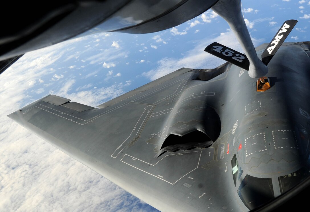 ANDERSEN AIR FORCE BASE, Guam - A 506th Expeditionary Squadron KC-135 refuels a 13th Expeditionary Bomb Squadron B-2 Spirit over the Western Pacific Ocean May 12.  More than 100 Airmen and four KC-135 Stratotankers from the 452nd Air Mobility Wing, March Air Reserve Base, Calif., deployed here at the end of April. (U.S. Air Force photo by Senior Airman Christopher Bush)