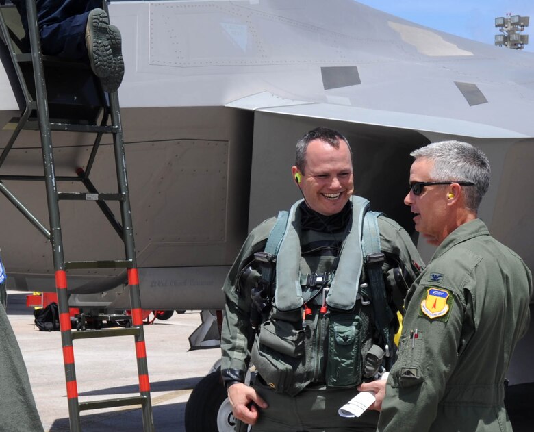 ANDERSEN AIR FORCE BASE, Guam – Col. Tod R. Fingal, 36th Operations Group commander, greets Lt. Col. Charles S. Corcoran, 525th Expeditionary Fighter Squadron commander, also known as the “5-2-5”, commander, after a 9 hour flight from his home station Elmendorf AFB, Alaska. The Raptors from the 525th EFS, also known as the “5-2-5,” are deployed in support of the Pacific Command’s Theatre Support Package. (U.S. Air Force photo by Christopher Bush) 