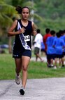 ANDERSEN AIR FORCE BASE, Guam -- Andersen Middle School student Quincy Tougher, runs during the All-Island Cross-Country meet May 7 at Asan Beach. Quincy placed second out of 52 female competitors. AMS's girls' cross country team receive top honors, tying with Commander William C. McCool Elementary Middle School and Harvest Christian Academy for first place. (Courtesy photo) 