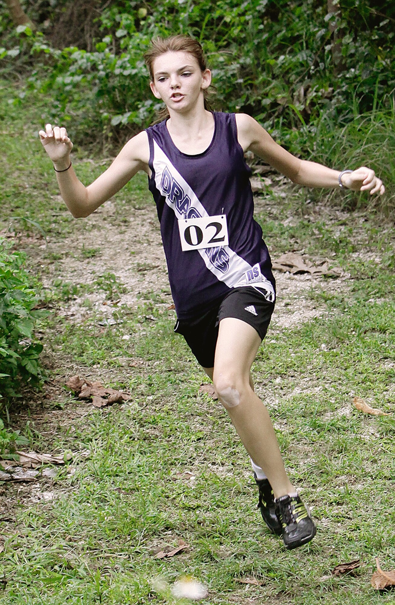 ANDERSEN AIR FORCE BASE, Guam -- Andersen Middle School student Alexis Bosworth, runs during the All-Island Cross-Country meet May 7 at Asan Beach. Alexis placed first out of 52 female competitors. AMS's girls' cross country team receive top honors, tying with Commander William C. McCool Elementary Middle School and Harvest Christian Academy for first place. (Courtesy photo) 