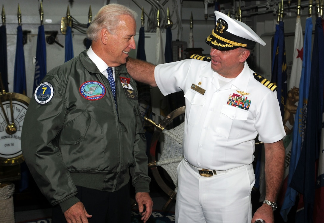 Vice
President Joe Biden receives a flight jacket from the commanding offficer
of the USS Ronald Reagan, Capt. Kenneth Norton, on the quarterdeck aboard the
Nimitz-Class aircraft carrier. The vice president
and his wife, Dr. Jill Biden, visited Ronald Reagan during a familiarization
tour of naval facilities in the San Diego area. Reagan is preparing for its
upcoming deployment to the Western Pacific and Indian Ocean later this
spring. U.S. Navy photo by Petty Officer 3rd Class Benjamin
Brossard