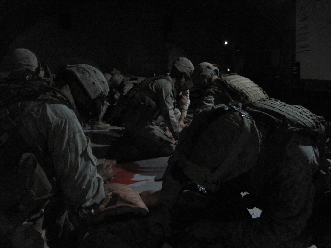 Marines attached to Combine Anti-Armor Team Platoon, Team 2, Battalion Landing Team 1st Battalion, 9th Marine Regiment, 24th Marine Expeditionary Unit, put skills learned during a Tactical Combat Casualty Care class to the test on life-like training dummies May 16.  During TCCC Marines learned steps  necessary to preserve life under combat conditions to better provide care for one another if ever required.