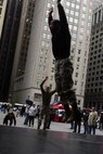 Sgt. Shurron D. Thompson, a Marine with Martial Arts Center of Excellence, demonstrates an exercise during an exercise event called 'Chicago Moves' at The Daley Plaza as part of Marine Week in Chicago May 13, 2009. Marines were invited to the event to showcase their workouts and martial arts program in order to further their involvement with the city. (U.S. Marine Corps photo by Cpl. Seth Maggard/Released)
