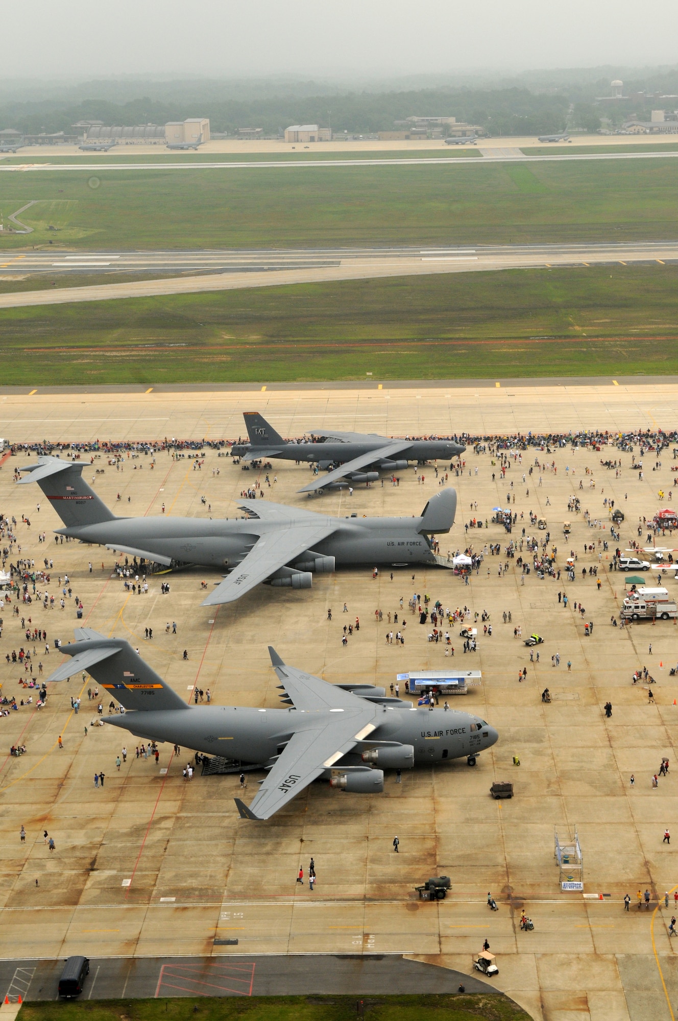 An aerial view of the crowd and static displays on the flightline during the Joint Service Open House May 16 at Andrews Air Force Base, Md. The three-day air show offered local community members a closer look at the advanced capabilities of the military services. (U.S. Air Force photo by Senior Airman Marleah Miller)