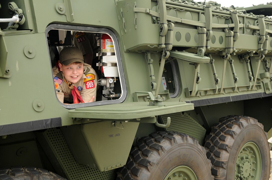 Zach Feltz of Boy Scout Troop 355 from Middle River, Md., peers through a window in an armored personnel carrier during the Joint Service Open House May 16 at Andrews Air Force Base, Md.  JSOH offers an opportunity for service members to meet and thank the public for their support and to show them America’s skilled military. (U.S. Air Force photo by Senior Airman Sean Adams)