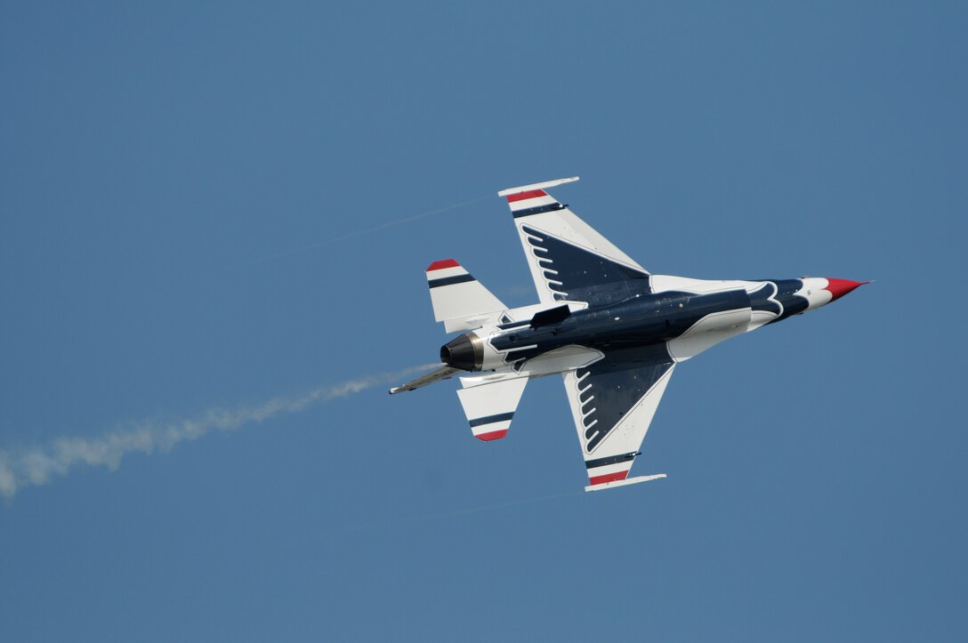 The U.S. Air Force Thunderbirds perform during the 2009 Joint Service Open House May 16 on Andrews Air Force Base, Md. The Thunderbirds perform about 70 shows in 35 different locations for more than 10 million people each year. JSOH offers an opportunity for service members to meet and thank the public for their support and to show them America's skilled military. (U.S. Air Force photo by Staff Sgt. Dan DeCook)