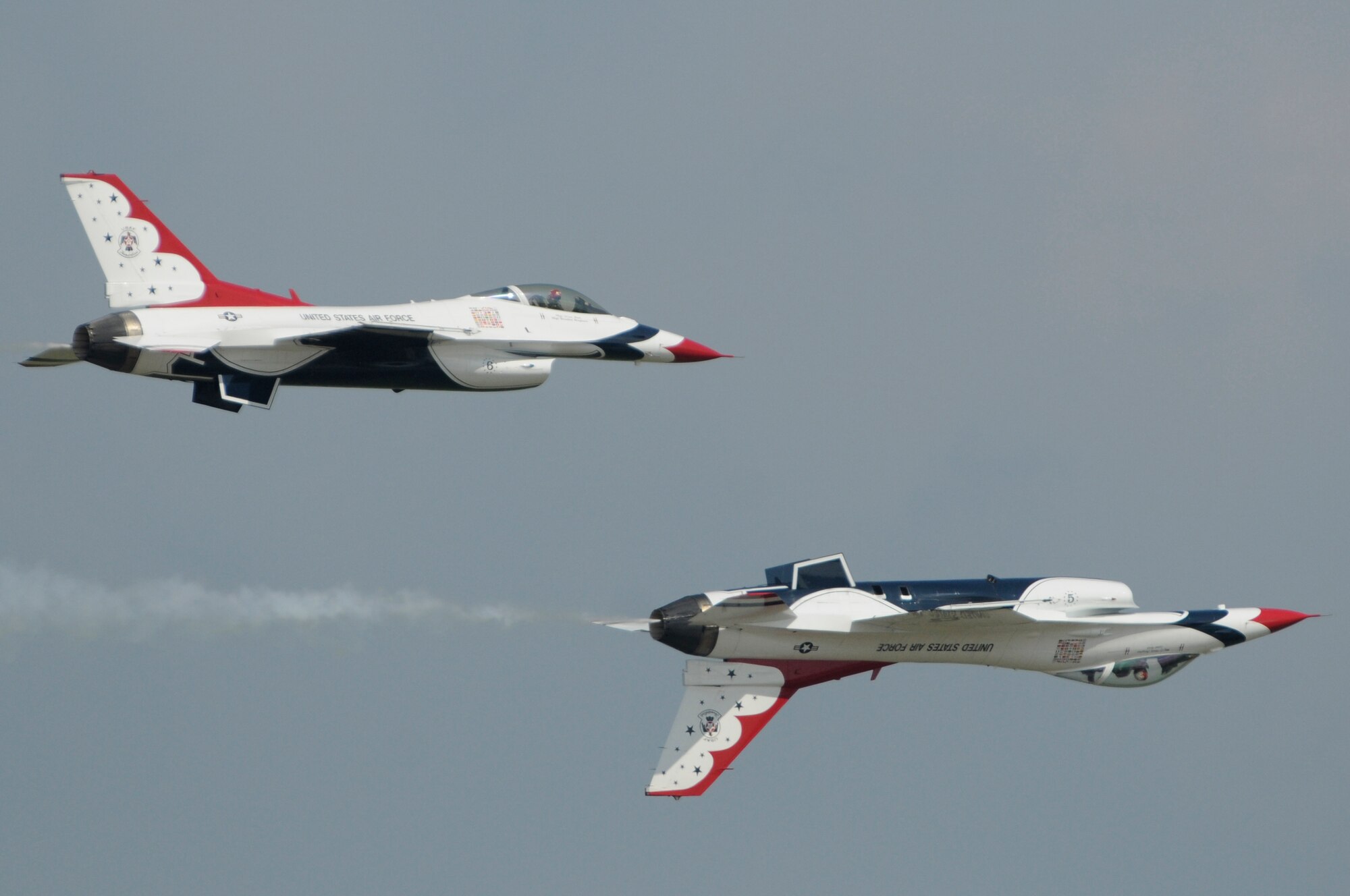 The U.S. Air Force Thunderbirds perform during the 2009 Joint Service Open House May 16 on Andrews Air Force Base, Md. The Thunderbirds perform about 70 shows in 35 different locations for more than 10 million people each year. JSOH offers an opportunity for service members to meet and thank the public for their support and to show them America's skilled military. (U.S. Air Force photo by Staff Sgt. Dan DeCook)