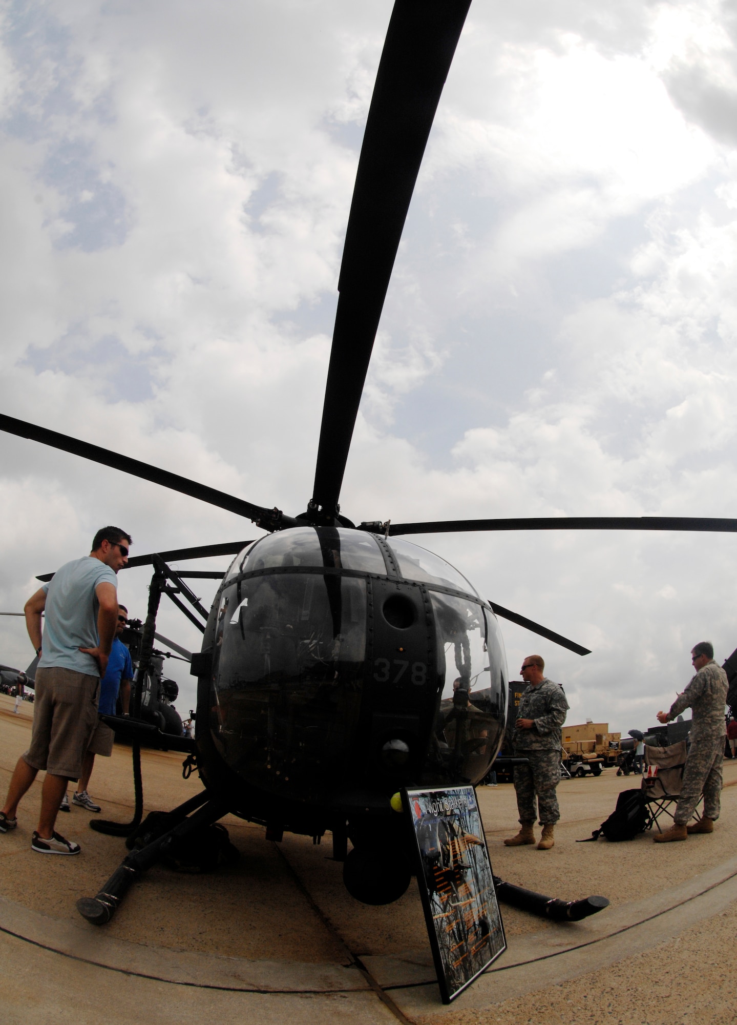 Department of Defense employees take a closer look at a U.S. Army “Night Stalker” helicopter at the 2009 Joint Service Open House at Andrews Air Force Base, Md., on May 15. JSOH allows members of the public an opportunity to meet and interact with the men and women of the armed forces. (U.S. Air Force photo by Airmen 1st Class Melissa V. Rodrigues)