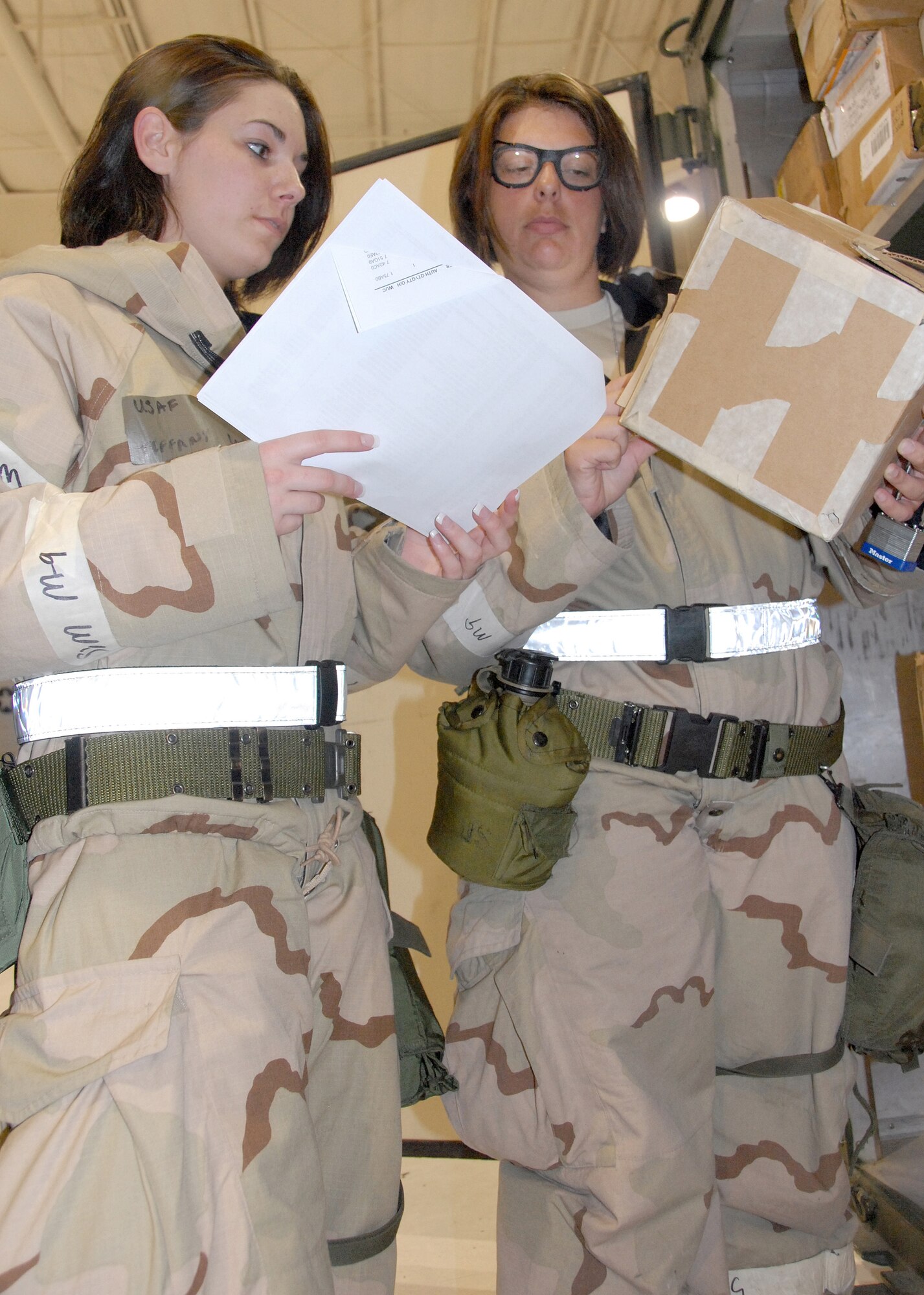 Airman Tiffany Loman and Senior Airman Rebecca Householder, 442nd Logistics Readiness Squadron, take inventory of supplies during an operational readiness exercise at Whiteman Air Force Base, Mo., May 15. The 442nd LRS is part of the 442nd Fighter Wing, an Air Force Reserve Command A-10 Thunderbolt II unit. (U.S. Air Force photo/Master Sgt. Bill Huntington)
