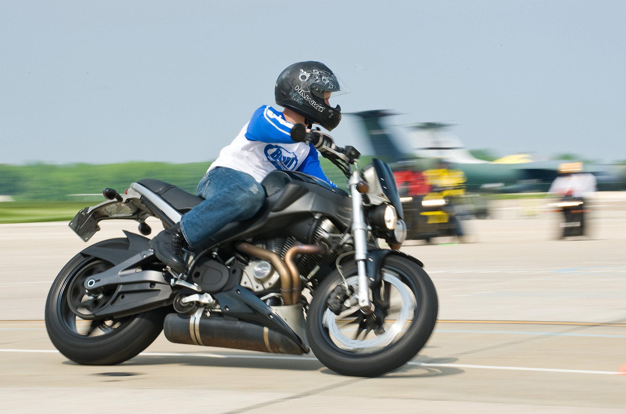 Capt. James McDaniel, 436th Medical Support Squadron Medical Logistics Flight commander, learns high-speed turning techniques at a sports bike training class at Dover Air Force Base May 8. The Air Mobility Command sport bike is a mandatory requirement for sports bike riders. (U.S. Air Force photo by Tom Randle)
