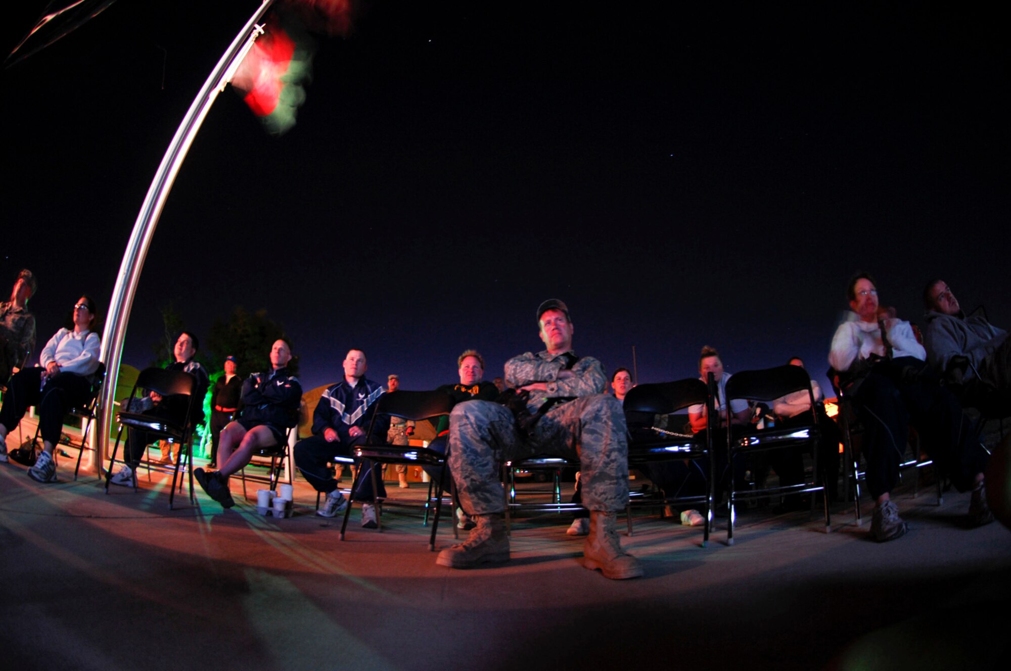 Airmen watch a movie under the stars at Bagram Air Field, Afghanistan, May 14. The event is hosted by the 455th Expeditionary Force Support Squadron every Thursday night. (U.S. Air Force photo/Senior Airman Erik Cardenas)