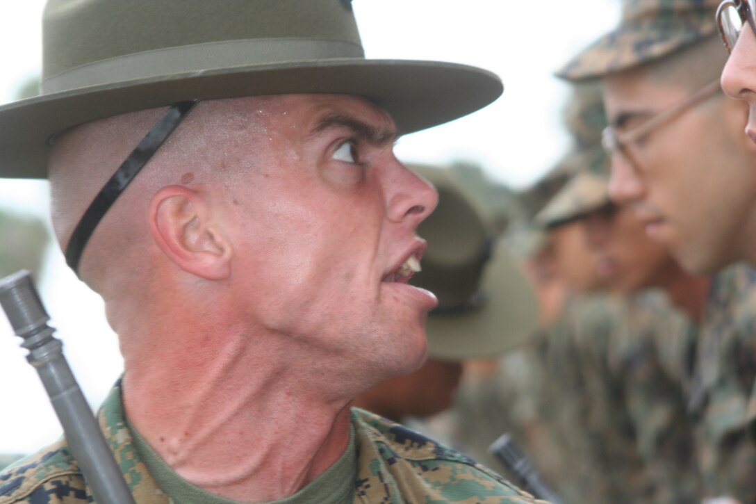 Staff Sgt. Kristopher Consiglio, 2nd Battalion drill master, corrects a recruit with intensity during a senior drill instructor inspection. Consiglio was nominated as 2nd Battalion's drill instructor of the year and was awarded by the Marine Corps Recruit Depot San Diego Museum Historical Society April 26.