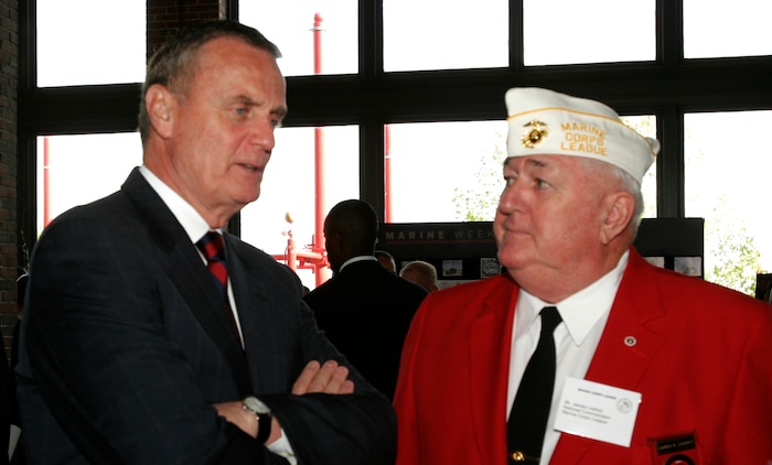Gen. James L. Jones,national security advisor and 32nd commandant of the Marine Corps, left, and James Jaskey, national commandant of the Marine Corps League,right, converse during the pre-dedication saturday in the reception room at Navy Pier.