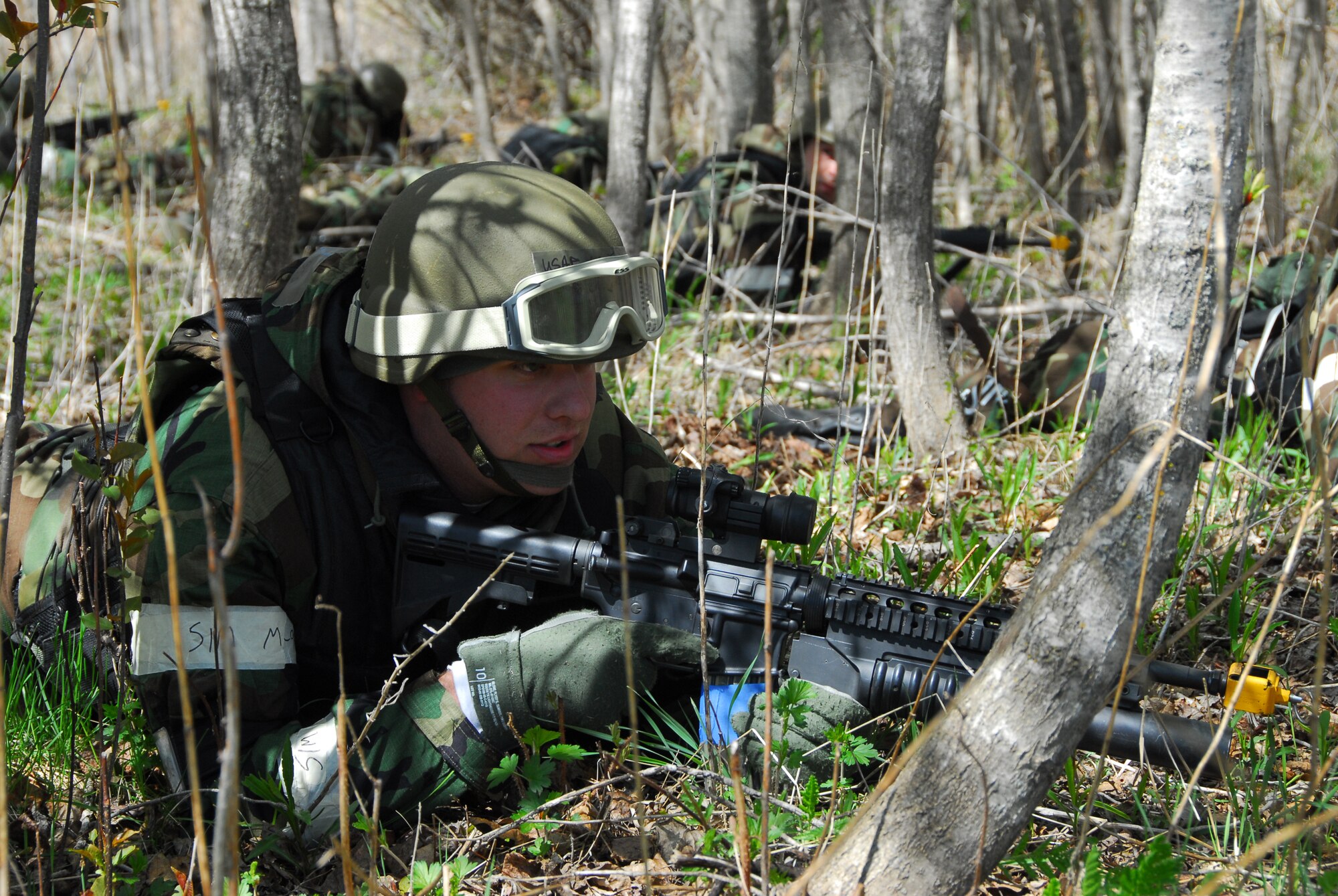 U.S. Air Force Staff Sgt. Casey Erickson, 148th Fighter Wing Security Forces, takes a defensive position while on patrol during the wing's Operational Readiness Exercise in Duluth, Minn., May 16, 2009.  The wing is preparing for an Operational Readiness Inspection by simulating a deployed wartime environment.  (U.S. Air Force photo by Master Sgt. Jason W. Rolfe) (Released)