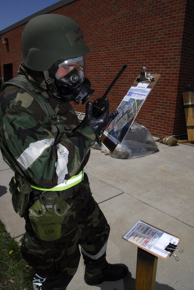 Senior Airman Kenneth Gese from the 148th Fighter Wing Communications Squadron provides Post Attack Reconnaissance after a simulated missile attack.  The attack was part of an Operational Readiness Exercise (ORE).  The 148th Fighter Wing, out of Duluth, Minn., is preparing for an Operational Readiness Inspection (ORI) in August 2009.  (U.S. Air Force photograph by Senior Master Sgt. Ralph J. Kapustka)