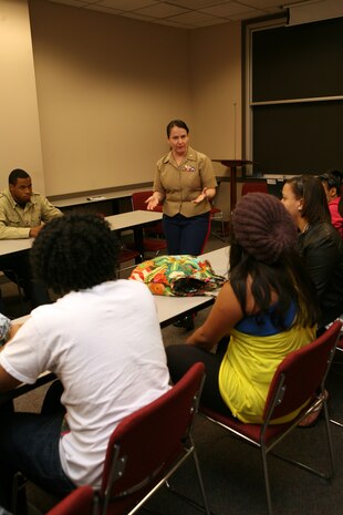Maj. Shawn D. Haney, 37, talks about the importance of communication with students from the YMCA's Black and Hispanic Achiever's program May 16.  The event, part of Marine Week Chicago, also allowed the students to learn about different aspects of life in the Marines Corps.