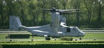 The MV-22 Osprey lands on the infield of the Arlington Park Racetrack May 17 during a raid demonstration by infantry Marines with Company F, 2nd Battalion, 24th Marines. The Marines were flown in on the CH-46 Sea Knight helicopter, the Marines exited the aircraft set-up security and waited for the MV-22 Osprey to land and pick them up.