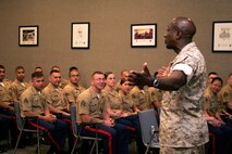 Sgt. Maj. Carlton W. Kent, sergeant major of the Marine Corps, acknowledges the success of recruiting while visiting 9th Marine Corps District May 19.  He met with Marines and sailors of 9th Marine Corps District, Recruiting Station Des Moines Sub-station South Omaha, and Recruiting Station Kansas City Sub-stations  K-Metro and Olathe May 18–19.