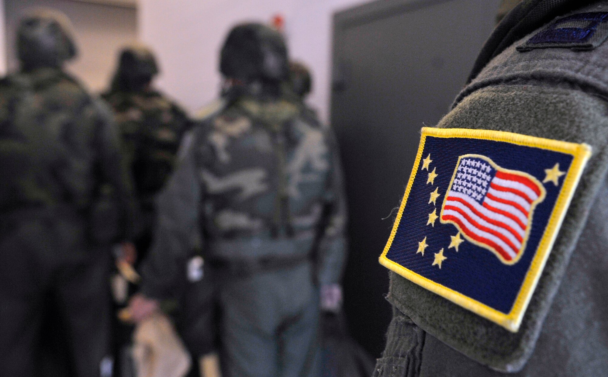 Airmen from the 168th Air Refueling Wing, Alaska Air National Guard, process through a personnel deployment function line during an operation readiness exercise at Eielson Air Force Base, May 18, 2009. The ORE is designed to test Eielson's capabilities of deployment readiness and operations.  (U.S. Air Force photo/Staff Sgt. Christopher Boitz)