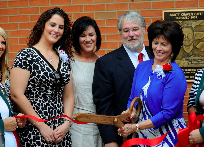 MOODY AIR FORCE BASE, Ga. -- Members of the Capt. Scott Craven family participate in a ribbon cutting ceremony dedicating the new Scott Craven Café at Sallas Mahone Elementary School in Valdosta, Ga., May 15. The Scott Craven Mentor Program was named in honor of Captain Craven who was one of the program’s original volunteers. (U.S. Air Force photo by Senior Airman Gina Chiaverotti)