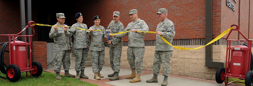 MOODY AIR FORCE BASE, Ga. -- Col. Kenneth Todorov, 23rd Wing commander, officially opens the new Emergency Communications Center here May 12. The facility underwent several upgrades that will allow for better coordination of all emergency services assets on Moody. (U.S. Air Force photo by Airman 1st Class Joshua Green) 


