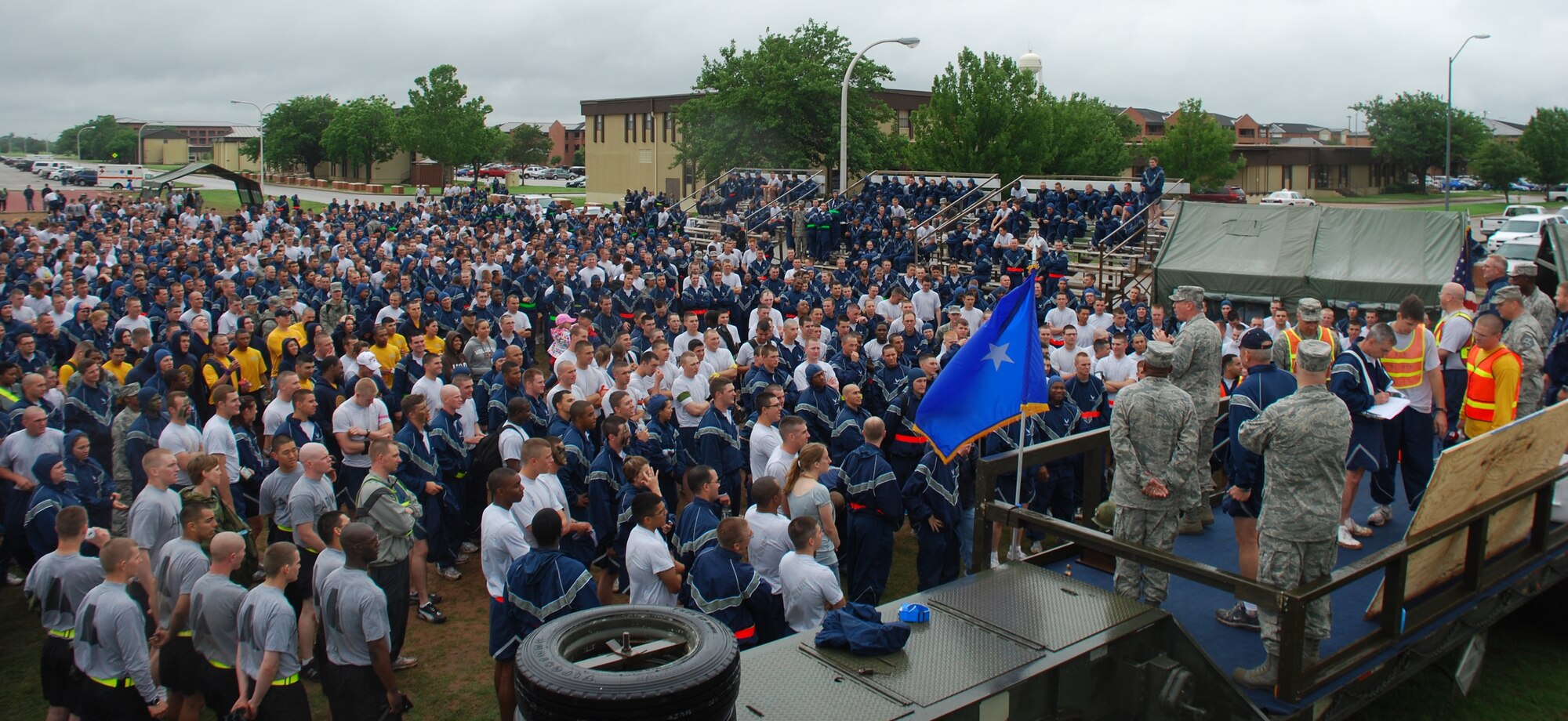 Airmen in Training gather around Brigadier General O.G Mannon, 82nd Training Wing commander, as he delivers the results of the Joint Warriors Challenge May 16 at the 1-mile track. The Airman, Sailors and Soldiers participated in a series of events competing for the championship title. (U.S Air Force photo/Airman Adawn Kelsey)