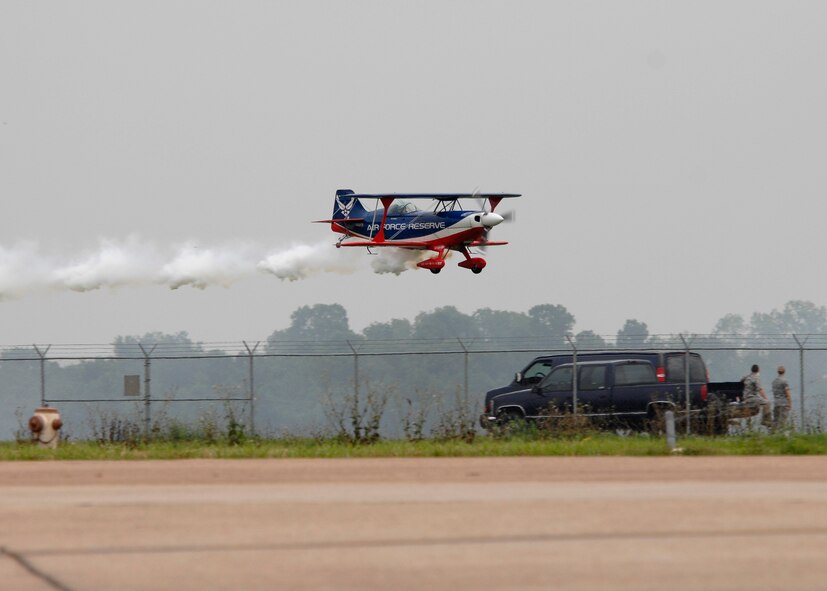 Ed Hamill performed aerial maneuvers for the 2009 Defenders of Liberty Air Show crowd in his aircraft Dream Machine May 9. The Dream Machine is a factory built biplane designed and first built by Curtis Pitts over fifty years ago. (U.S. Air Force Photo by Trina R Jeanjacques) (Released)